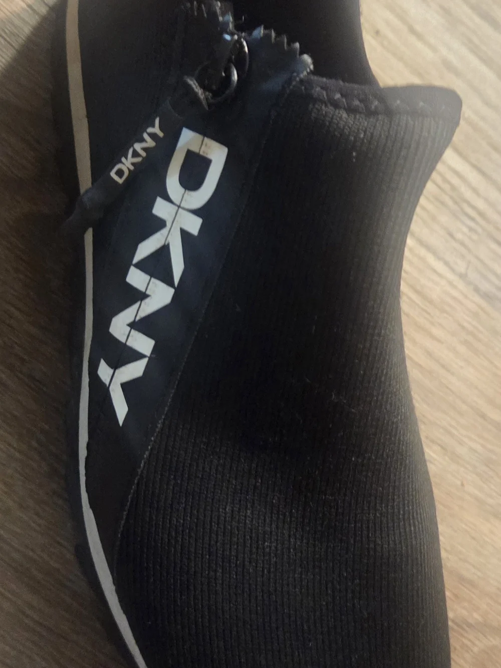 DKNY Men’s Black Slip-On Knit Sneakers